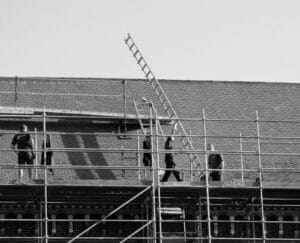 Professional roofing crew performing a safety inspection in Boise
